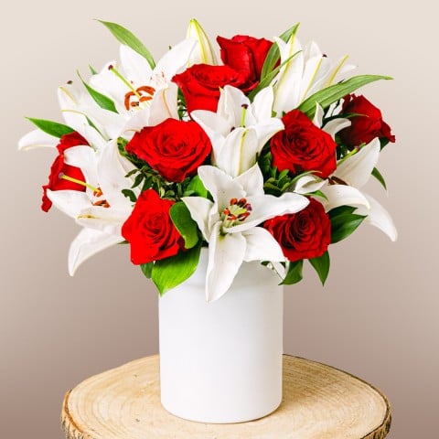 Love note: Red roses and white lilies